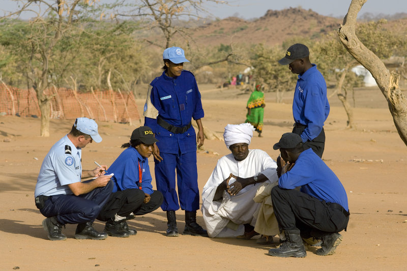 United Nations Police working in the United Nations Mission in Chad (MINURCAT) with the Détachement Intégré de Sécurité (DIS) at a refugee camp in Farchana. UN Photo: Olivia Grey Pritchard