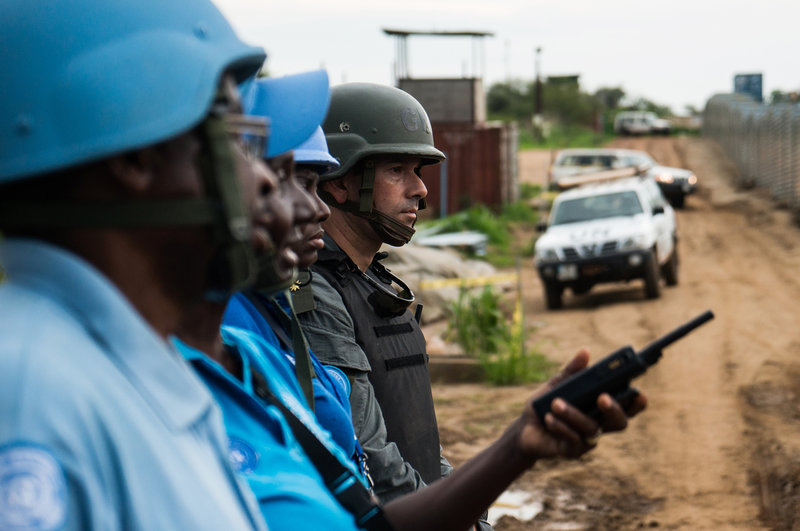 United Nations police officers conducting a search operation at a protection of civilians site in South Sudan. Photo: UNMISS/ Ilya Medvedev